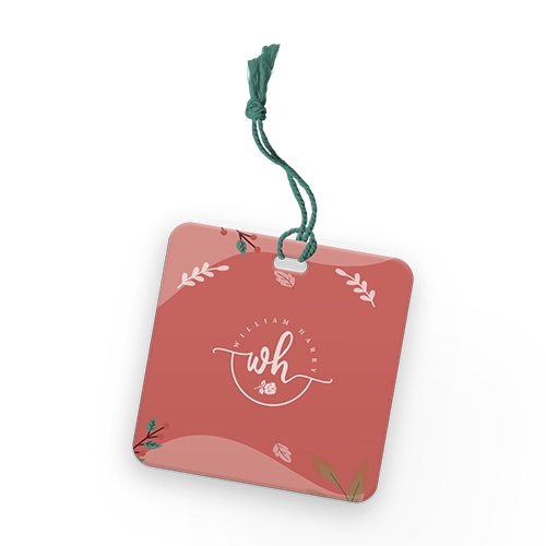 Clothing tags with round corners and custom design, includes a custom made string for luxury look