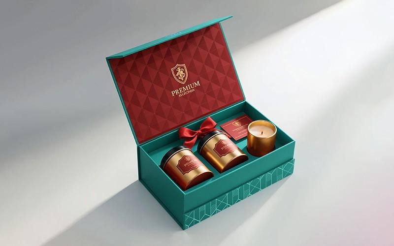 Custom rigid gift box packaging with premium inserts, foil-stamped branding, and luxury candle product presentation