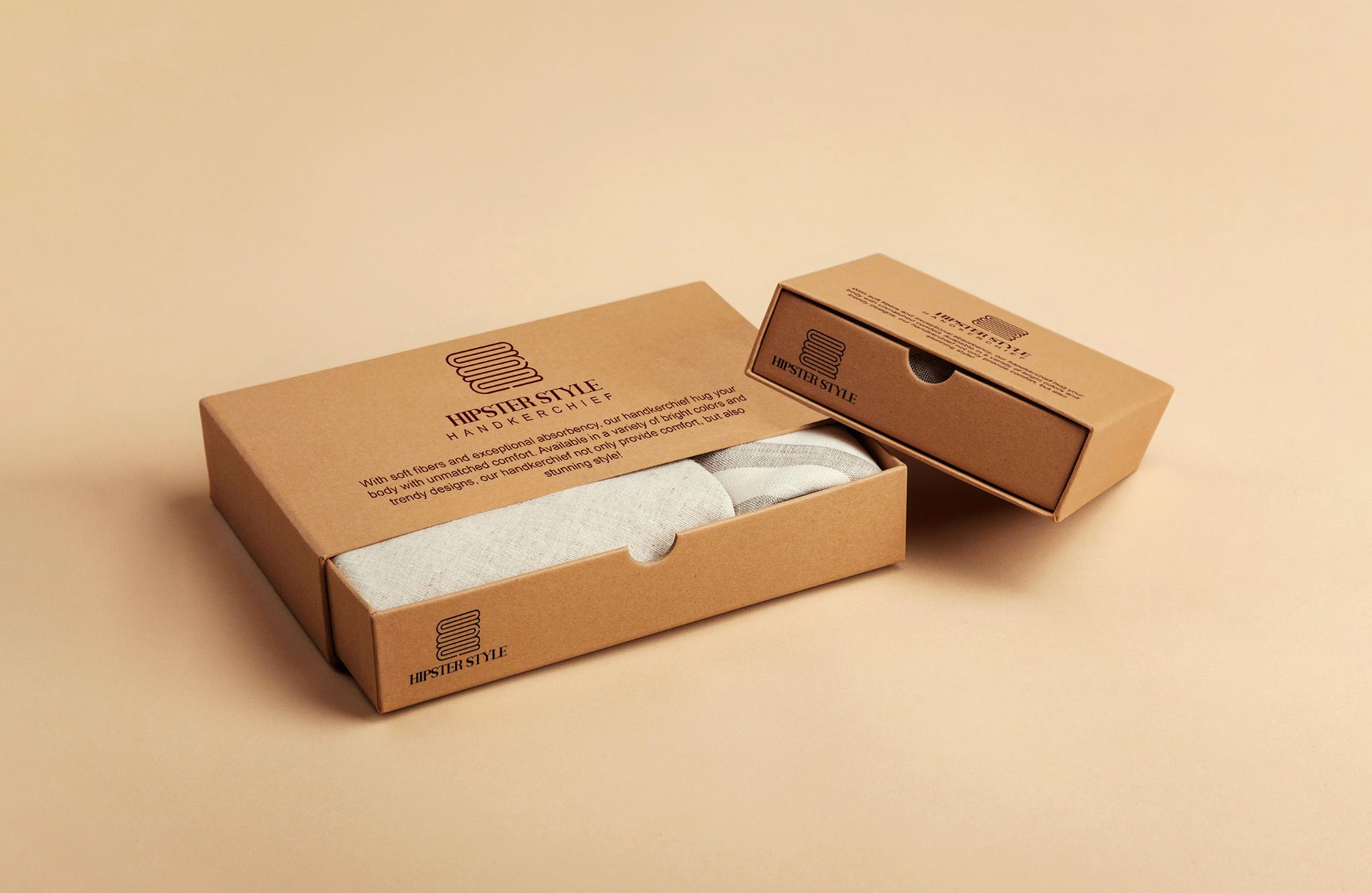Minimalist printed, sustainable kraft apparel packaging featuring slide-out drawer boxes for accessories